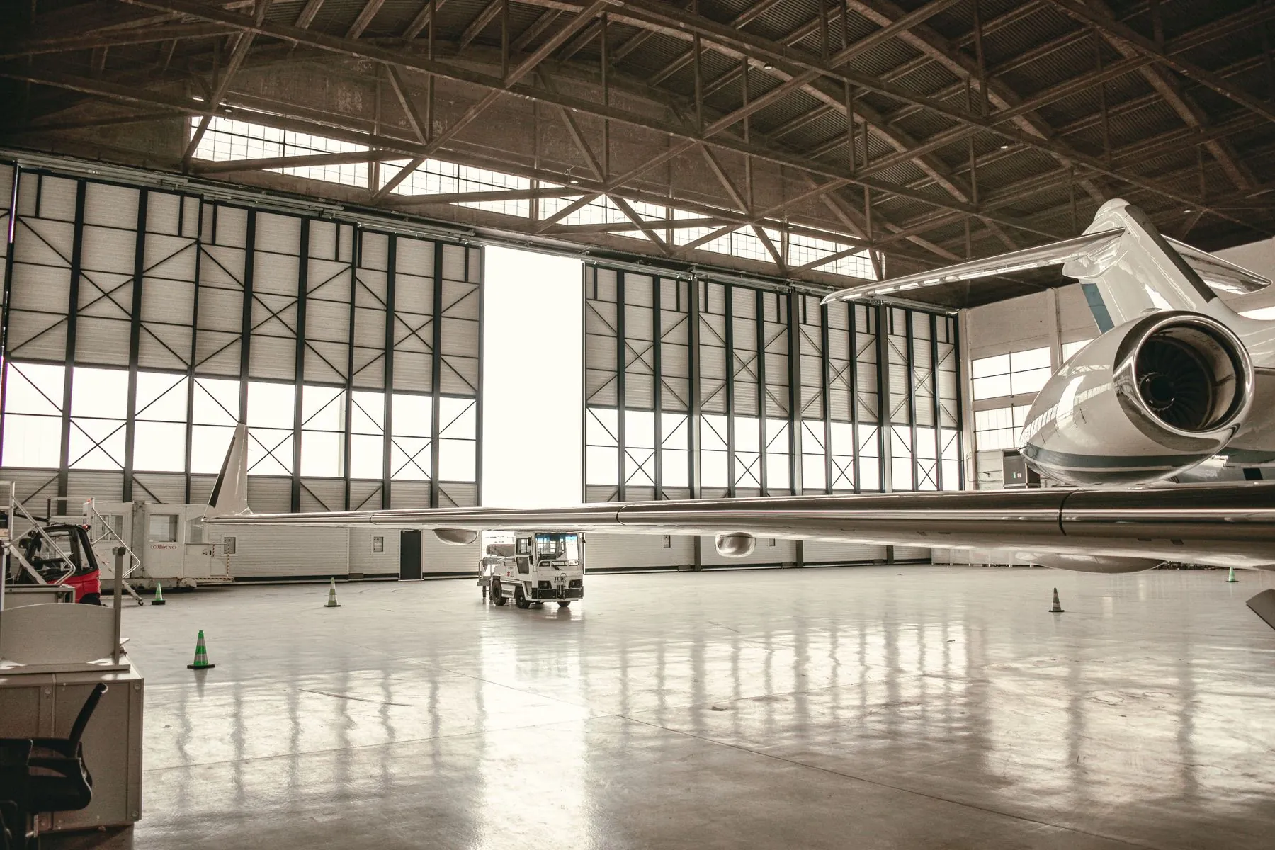 Wide interior view of an aircraft maintenance hangar